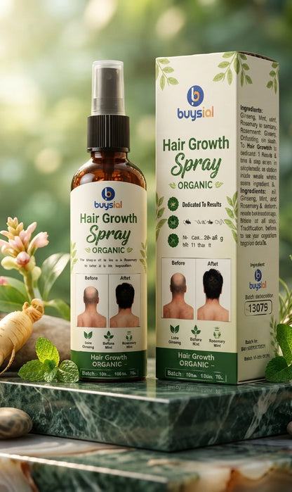 A bottle and box of buysial Hair Growth Spray Organic displayed on a green marble surface with herbal props like ginger root, mint leaves, and flowers against a soft-focus green background.